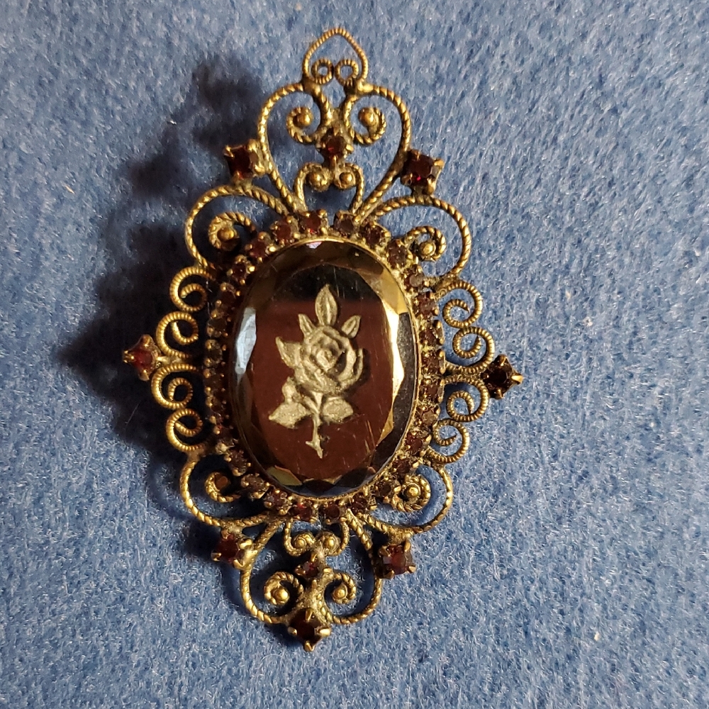 Elegant Antique Goldtone and Black Filigree Brooch